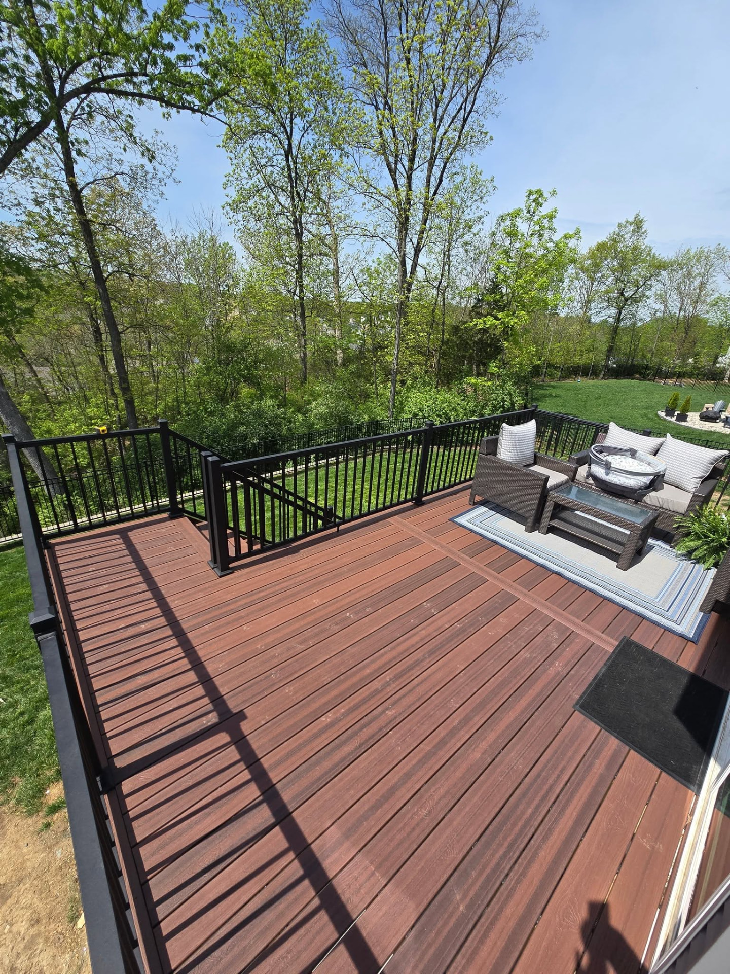 Shaded Auburn composite boards on the 20' × 12' deck, viewed from above by B&R Construction